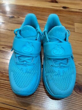 Stephen Curry Under Armour Kids Bright Turquoise Athletic Sneakers